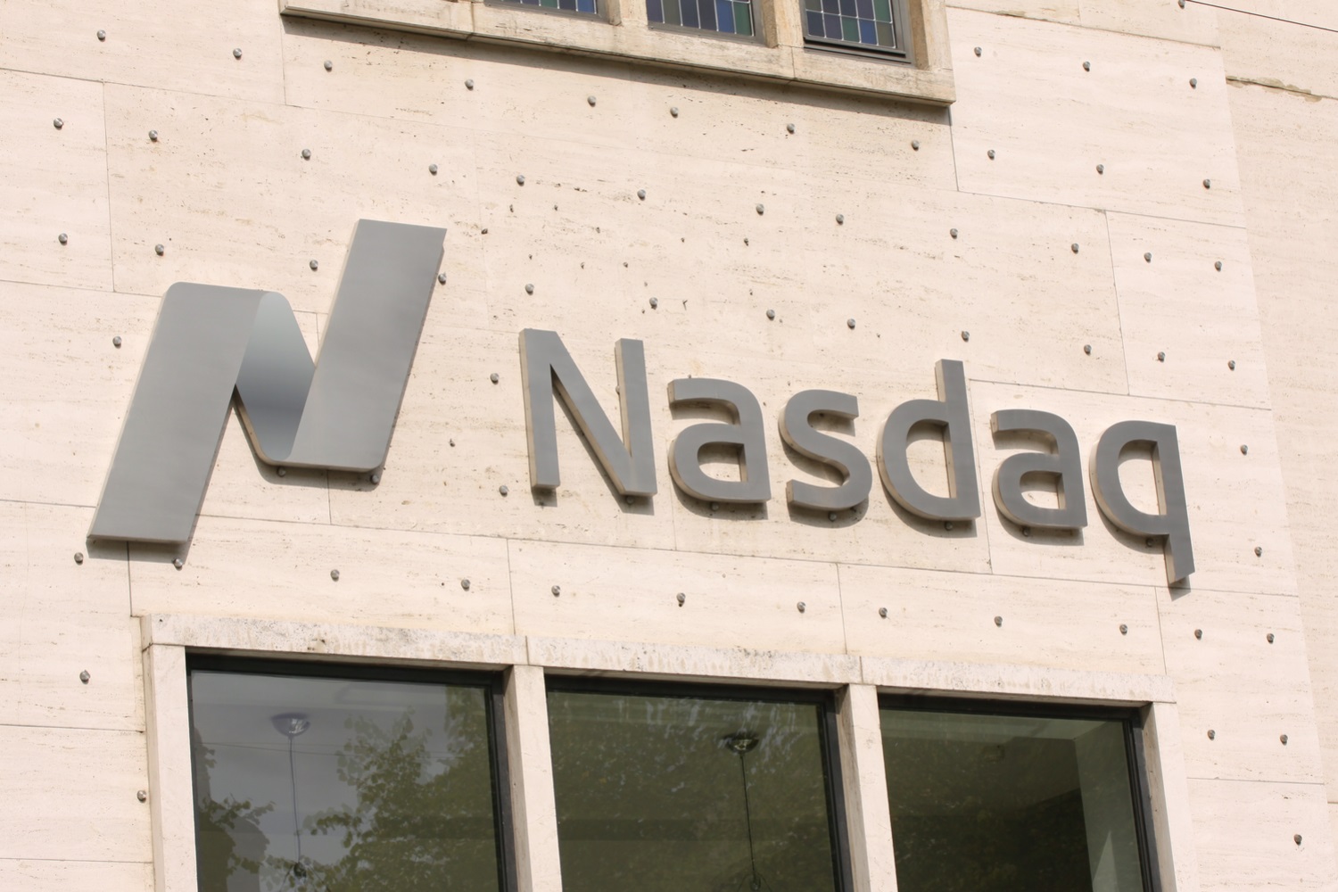 Token Exchange To Enable Trading Of Nasdaq-Listed Companies